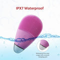 Pink facial cleansing massager brush by Everything Baby, rechargeable electric handheld face massager with waterproof soft silicone.