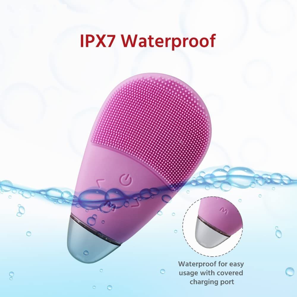 Pink facial cleansing massager brush by Everything Baby, rechargeable electric handheld face massager with waterproof soft silicone.