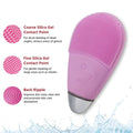 Pink facial cleansing massager brush by Everything Baby, rechargeable waterproof handheld face and baby skin hygiene tool.