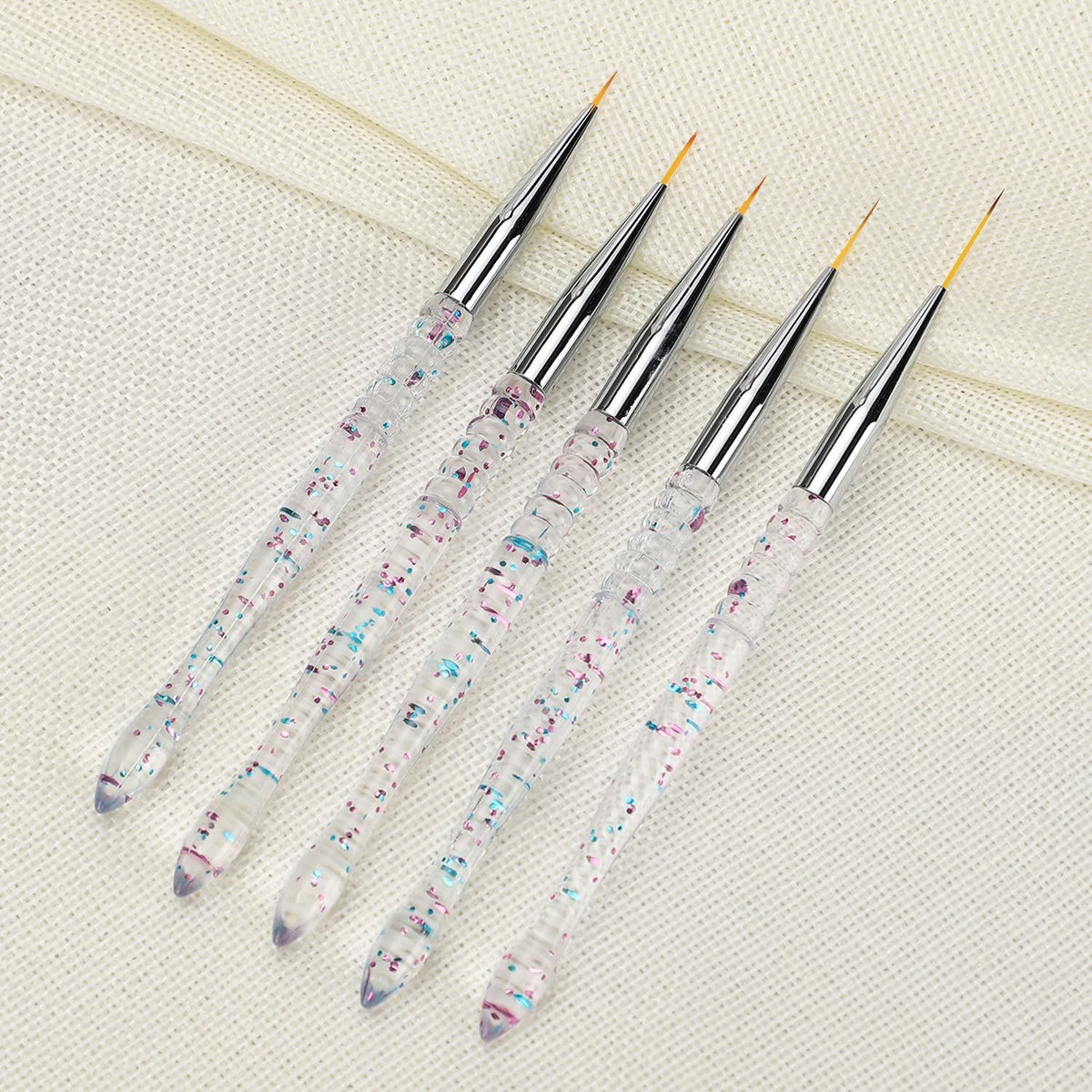 Set of 5 nail art liner brushes from Everything Baby, thin gel polish pens for detailed nail designs and drawing.