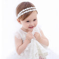 Soft, stretchy baby hair band from Everything Baby, ideal for newborns, toddlers, and special occasions like baptisms and weddings.