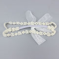 Soft stretchy baby hair band by Everything Baby, ideal for newborns, infants, and toddlers for special occasions and everyday wear.