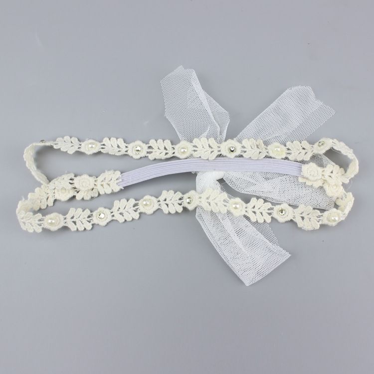 Soft stretchy baby hair band by Everything Baby, ideal for newborns, infants, and toddlers for special occasions and everyday wear.