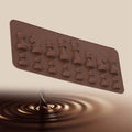 Silicone mold featuring chess piece shapes for chocolate, fondant, and cake toppers, ideal for baking and decorating.