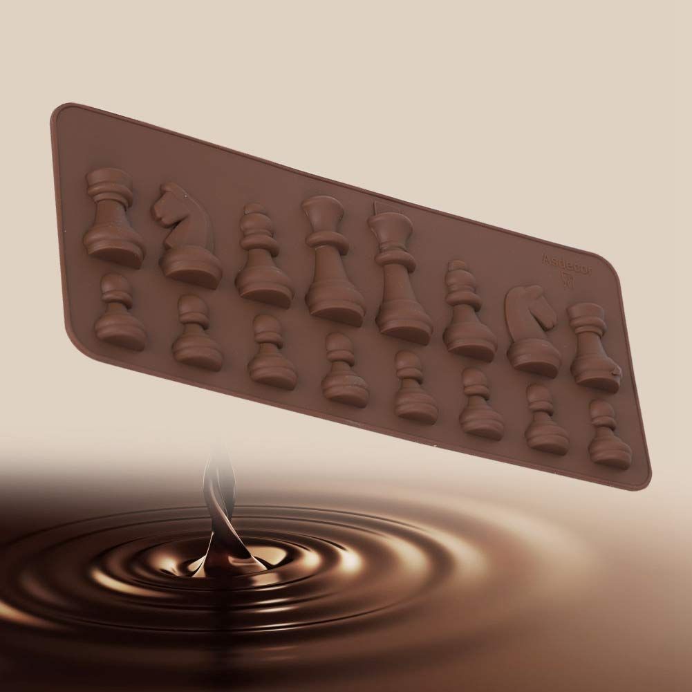 Silicone mold featuring chess piece shapes for chocolate, fondant, and cake toppers, ideal for baking and decorating.