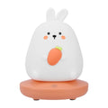 Cute carrot-shaped rabbit LED night light for children, made of silicone, adjustable brightness, perfect for kids' rooms.