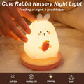 Cute carrot-shaped rabbit LED night light for children, made of silicone, adjustable brightness, ideal for kids' rooms.