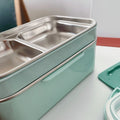 Blue stainless steel double-layer bento box for kids, portable food container for lunch and snacks, from Everything Baby.