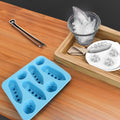 Baby and kids' building toy with Iceberg ice cube tray mold by Everything Baby, featuring film-themed shapes for creative play.