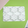 Silicone flower-shaped chocolate candy mold for baking, ice cubes, and DIY crafts, suitable for parties and festive occasions.