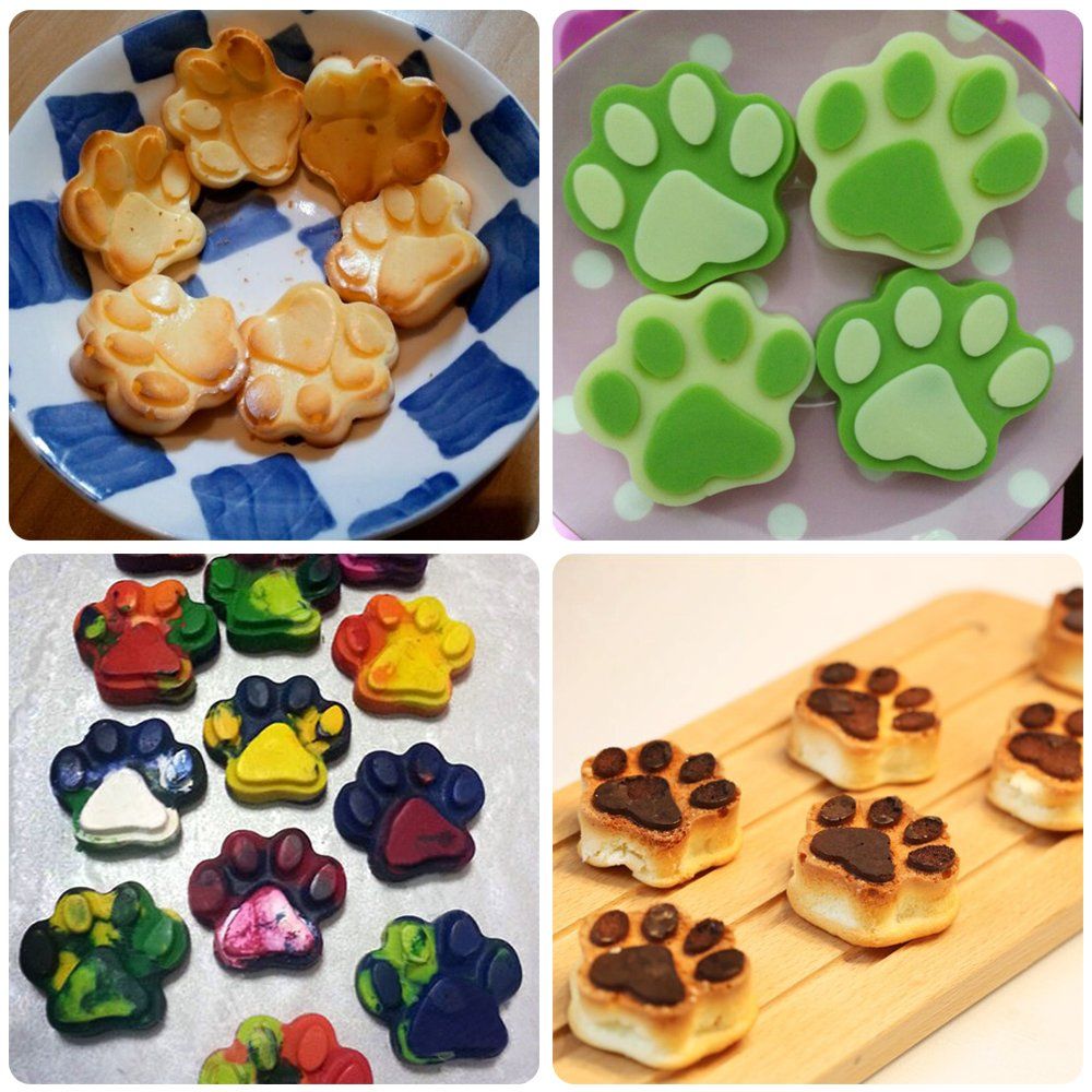 Colorful paw and bone-shaped bakeware set in pink, red, and purple for baking chocolates and candies, dishwasher safe.