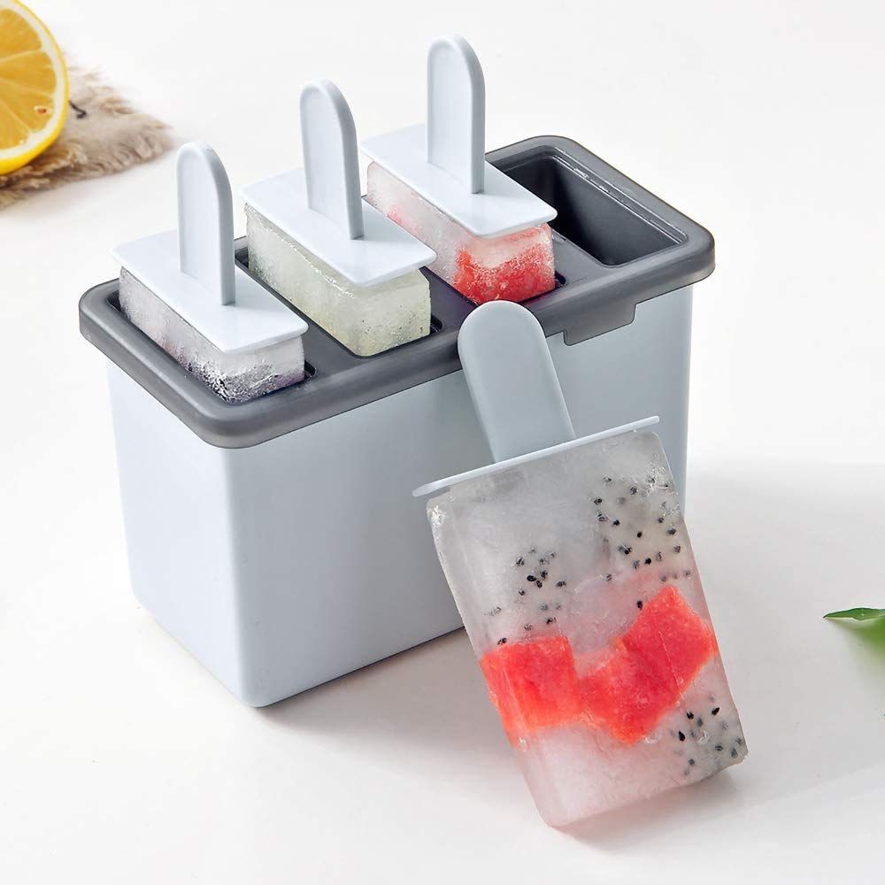 Reusable popsicle molds with four cavities for easy release, perfect for making homemade ice pops for kids.
