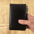 Small hardcover spiral pocket notebook by Everything Baby, ideal for travel and work, featuring a compact design for kids.