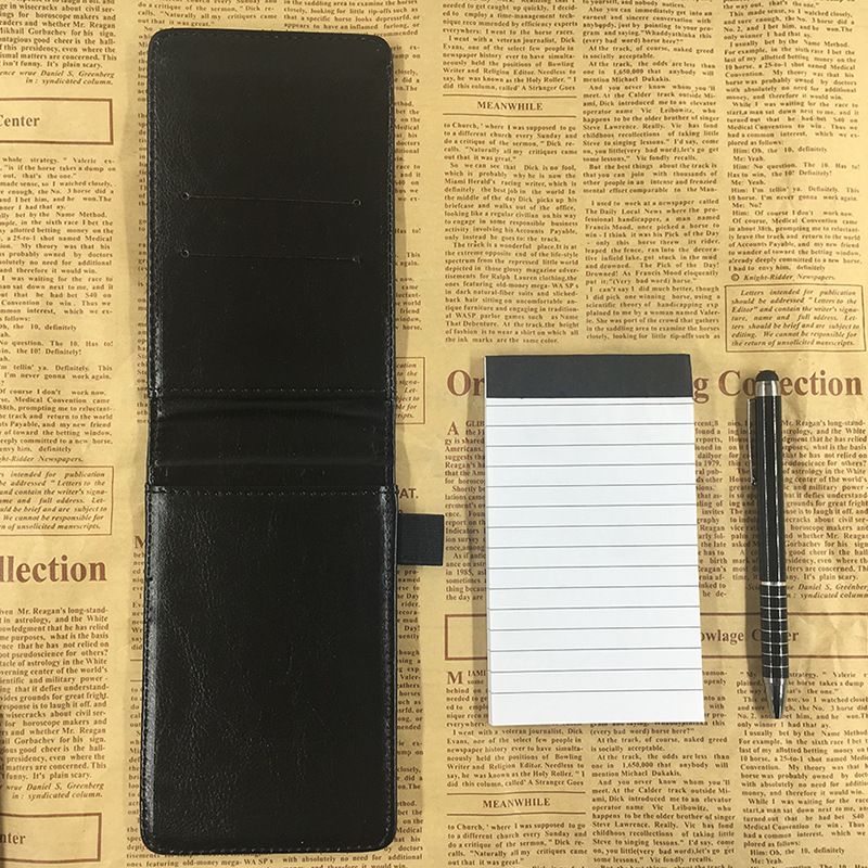 Small hardcover spiral pocket notebook by Everything Baby, suitable for travel and work, featuring a compact design.