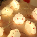 Cute baby cloud night light with face, warm white glow, ideal for kids' room decor, pretend play, and cozy Halloween or Christmas ambiance.