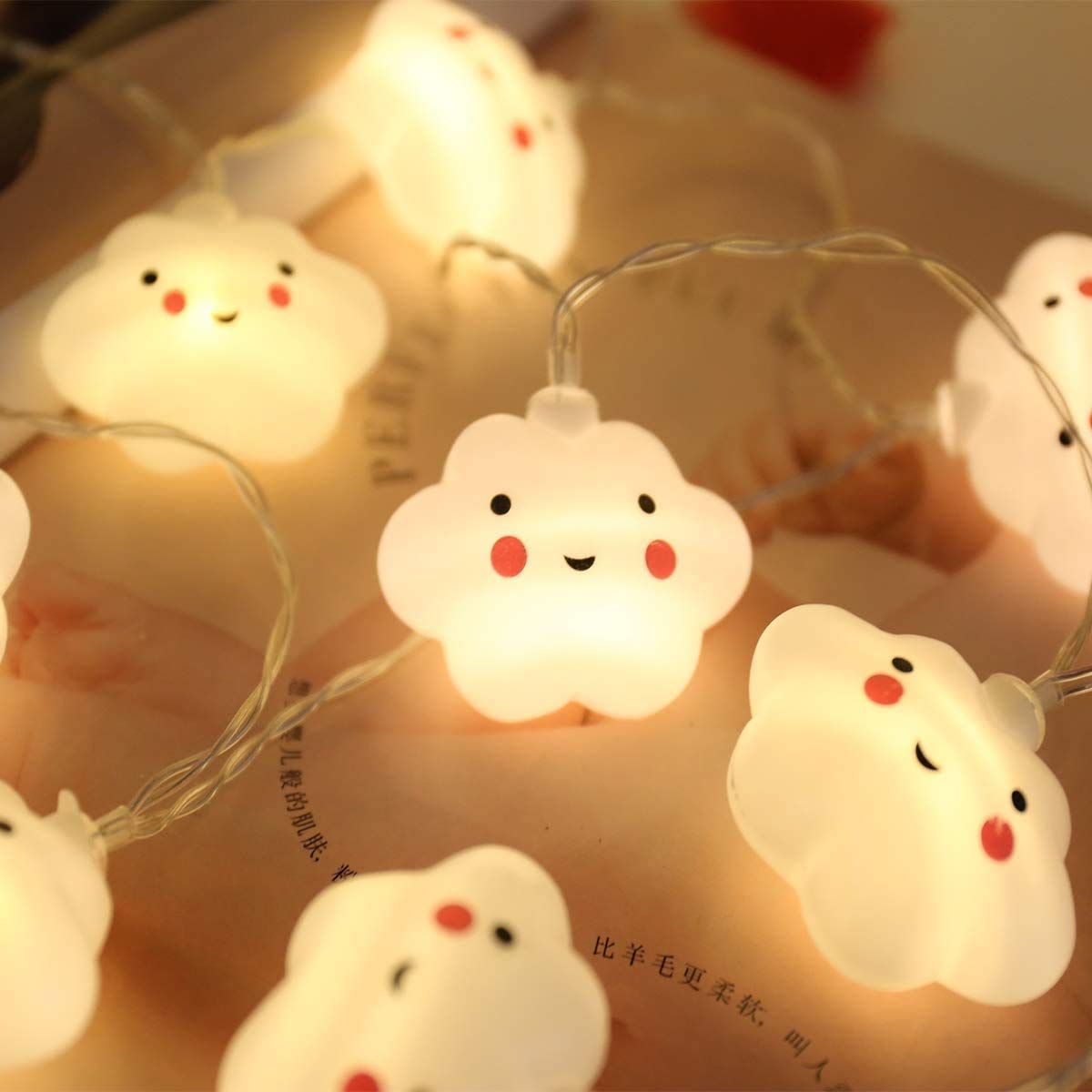 Cute baby cloud night light with face, warm white glow, ideal for kids' room decor, pretend play, and cozy Halloween or Christmas ambiance.