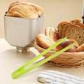Silicone food clip from Everything Baby, ideal for sushi, barbecue, steak, and kimchi, used for food handling and kitchen cooking.