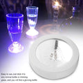 Round LED coaster glowing with vibrant light, designed for beer and wine glasses, perfect for parties and bar settings.