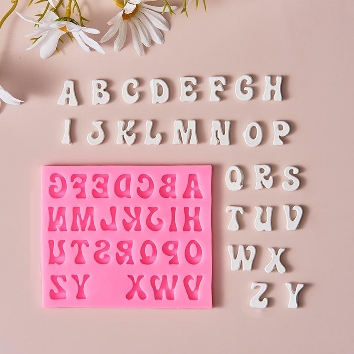 Silicone alphabet and number baking mold with 3D letters and numbers for cake and fondant decoration, from Everything Baby.