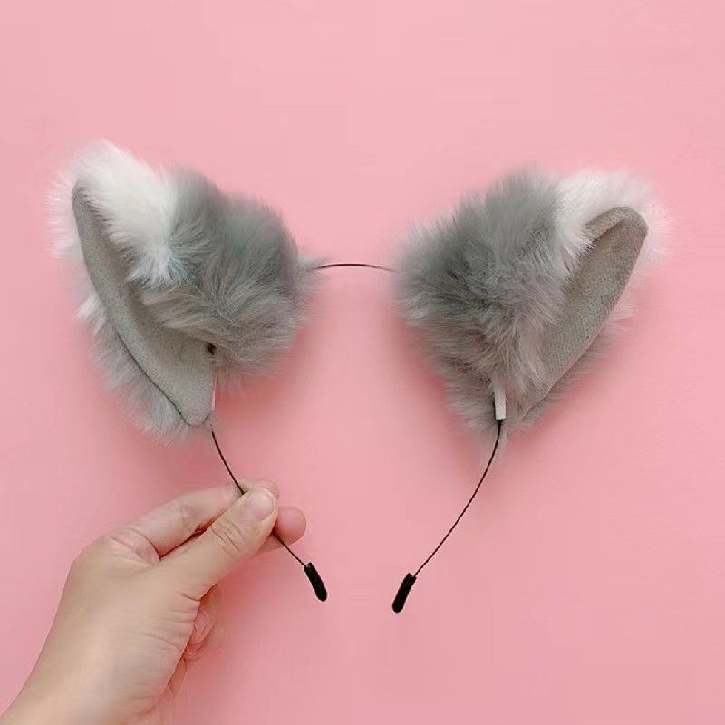 Cute fluffy girl’s cat ears headband with long fur, perfect for cosplay or parties, styled as a fun and playful accessory.