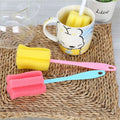 Three cleaning brushes for baby bottles and thermos mugs, made by Everything Baby, with colorful sponge tips for thorough cleaning.