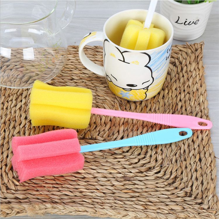 Three cleaning brushes for baby bottles and thermos mugs, made by Everything Baby, with colorful sponge tips for thorough cleaning.