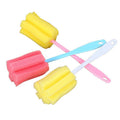 Three cleaning brushes for baby bottles and thermoses, with sponge tips, in various colors, suitable for baby and kids feeding bottles.