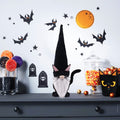 Faceless dwarf Halloween doll and black cat figurines for Halloween party decorations, suitable for pretend play and festive decor.
