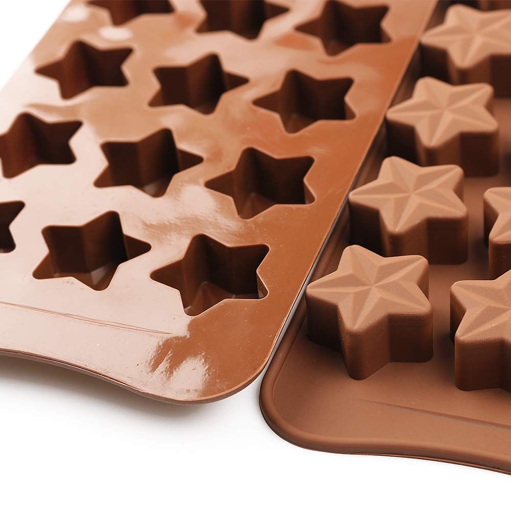 Set of four star-shaped silicone molds for chocolate, candy, and jelly, non-stick and ideal for baby and kids feeding treats.