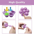 Colorful 7-cavity silicone popsicle mold with purple exterior, ideal for DIY ice pops, baby food, and pretend play for kids.