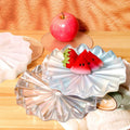 Silicone draining tray mold for fruit snacks, baby food, or craft projects, featuring colorful fruit-shaped designs for kids' feeding and DIY.