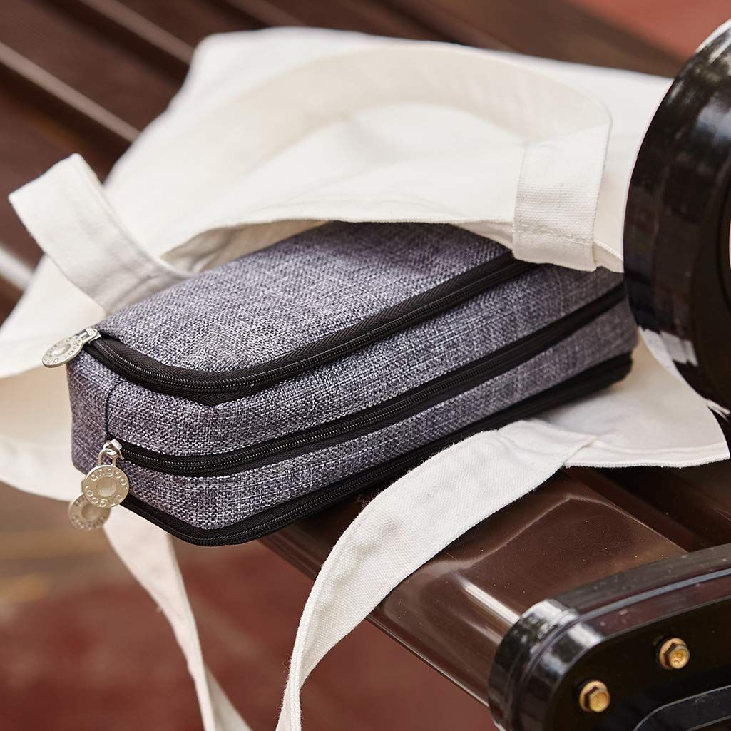 Large canvas pencil case with three compartments, ideal for teens and students to organize pens and pencils.