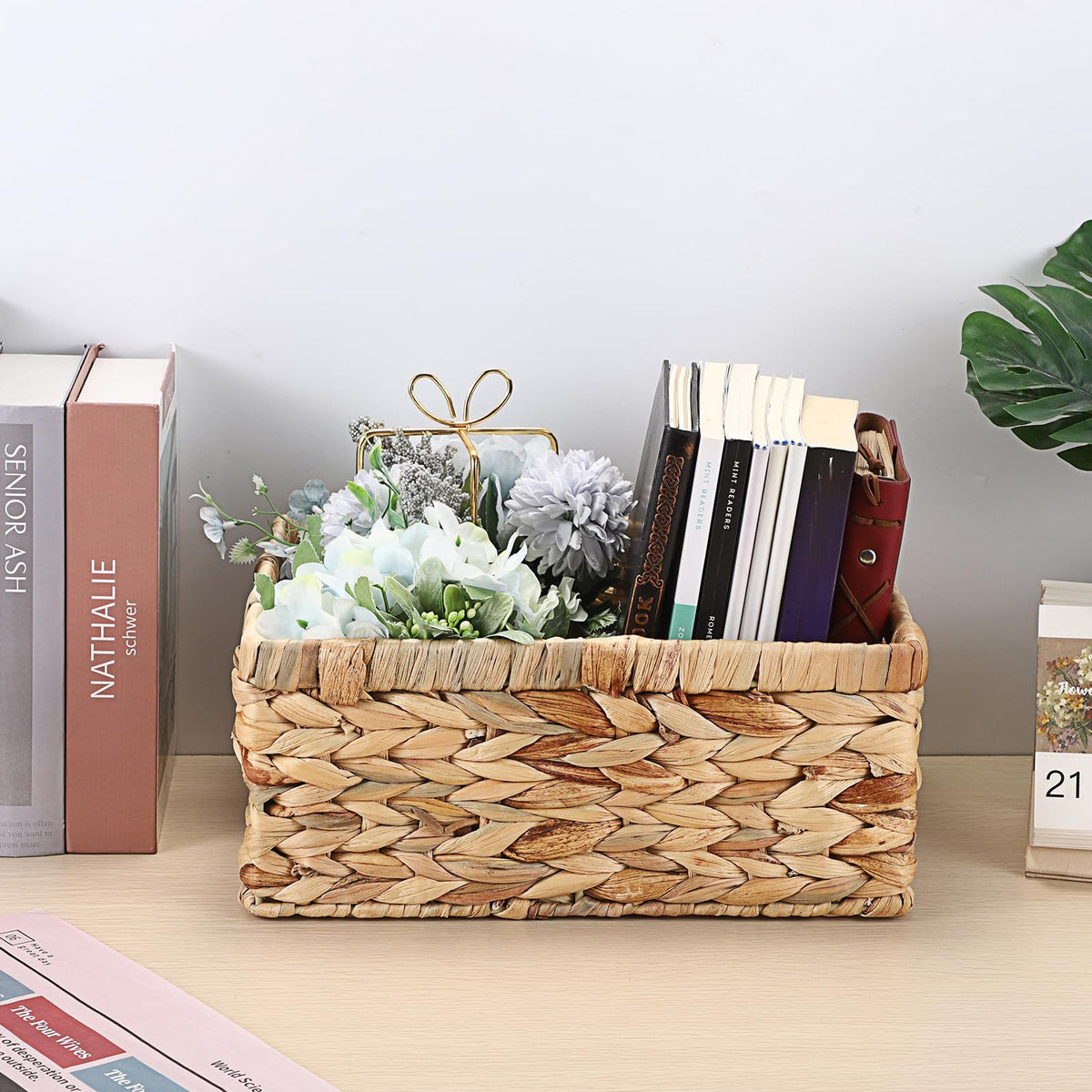 Handwoven water hyacinth storage basket with handles, small decorative wicker bin for organization and outdoor play use.