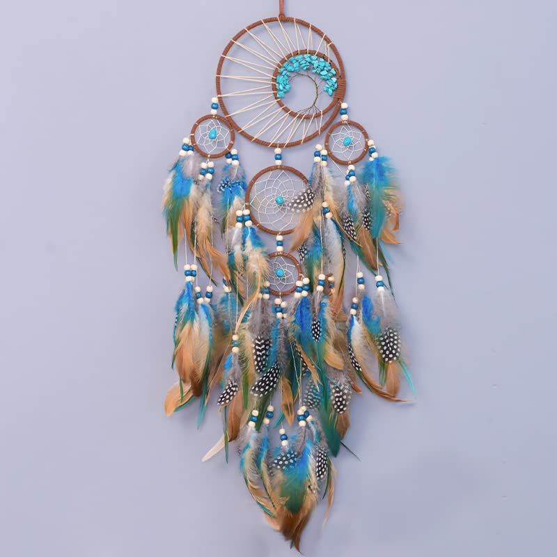 Small blue and brown feather dream catcher by Everything Baby, wall hanging decor for kids' bedrooms or pretend play.