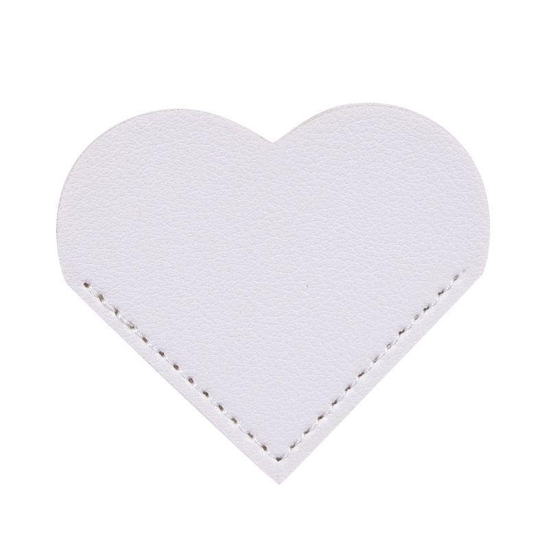 Set of 5 leather heart bookmarks from Everything Baby, cute handmade corner page marks for kids and book lovers.