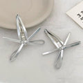 Set of 4 silver leather bow hair clips for girls, featuring snap closure and cute bowknot design, ideal for kids' bangs and hair styling.
