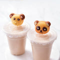 Non-stick 8-cavity cake baking pan with panda and bear molds, ideal for baking muffins, brownies, and cheesecakes.