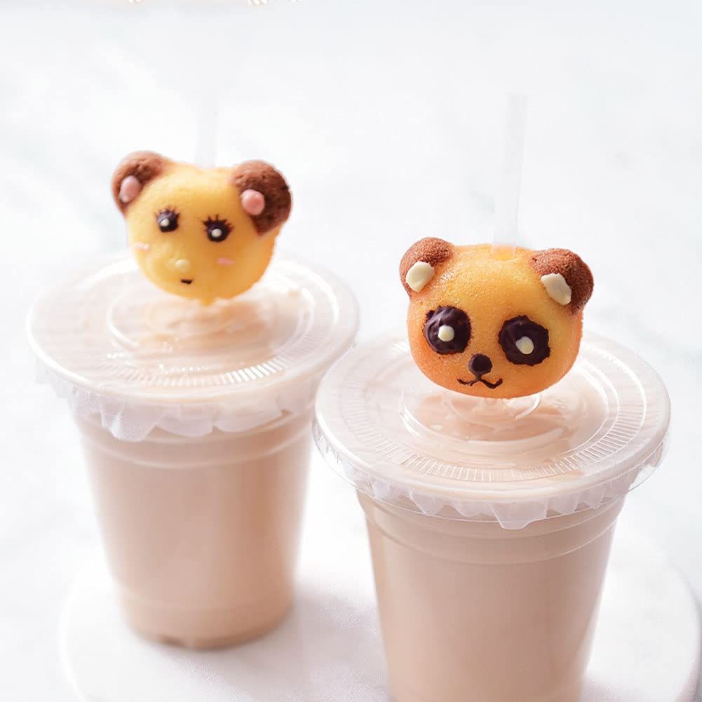 Non-stick 8-cavity cake baking pan with panda and bear molds, ideal for baking muffins, brownies, and cheesecakes.
