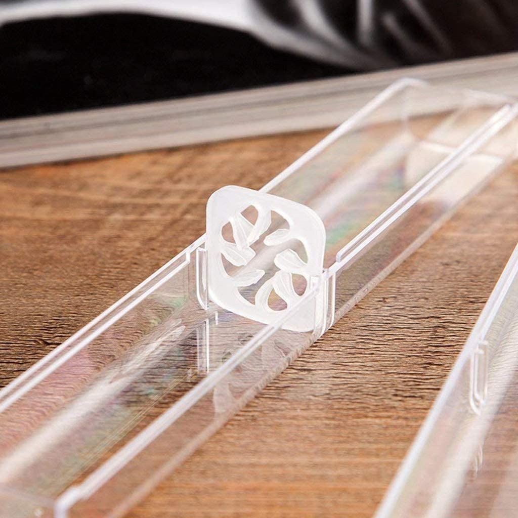 Eight clear plastic ballpoint pen gift boxes from Everything Baby, ideal for storing pens and pencils for school or business use.