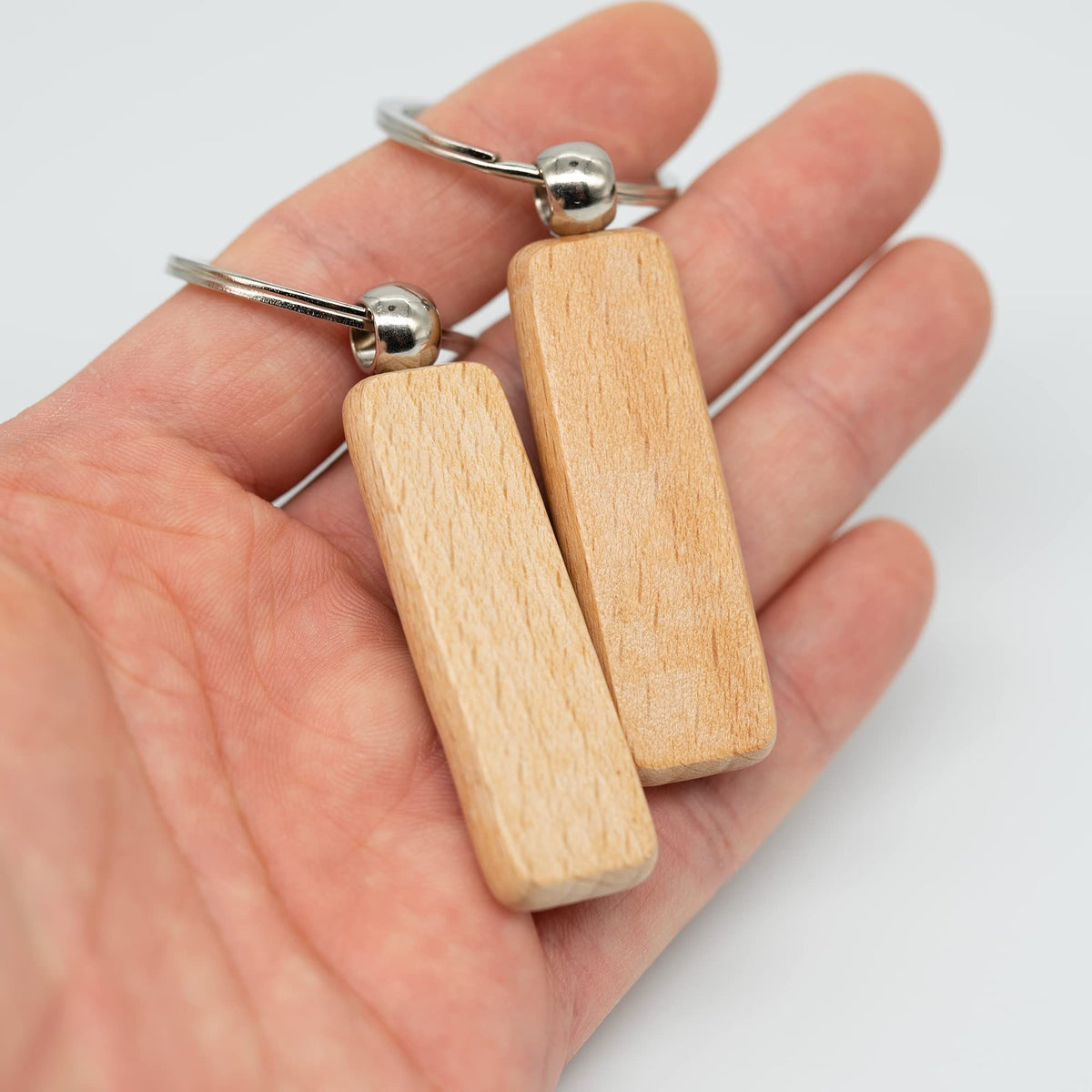 Set of 20 lightweight wooden rectangle blanks for keychains, ideal for DIY crafts and engraving projects, by Everything Baby.