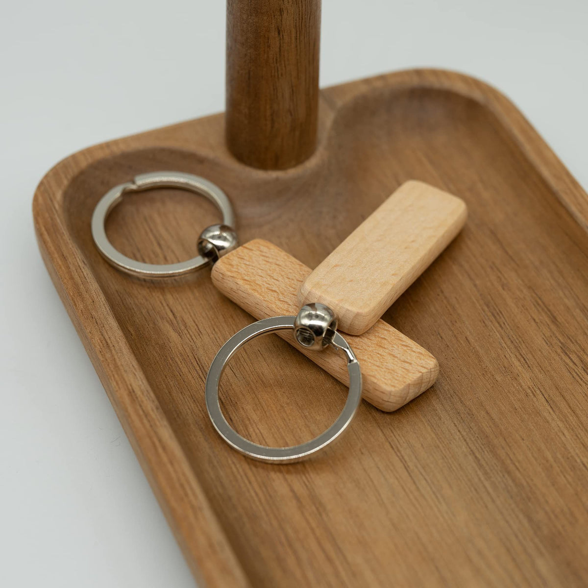 Set of 20 lightweight wooden rectangular blanks for keychains, perfect for crafting and DIY projects, by Everything Baby.