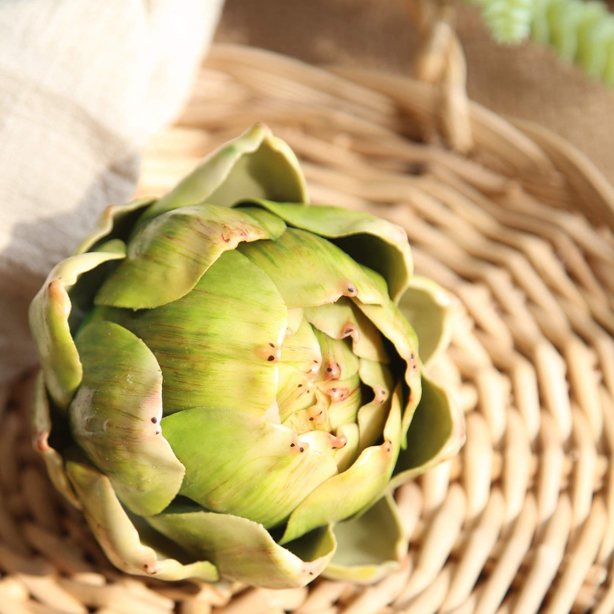 Artificial plastic artichoke vegetable for decoration, suitable for wedding, party, or home table display, from Everything Baby.
