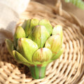 Artificial plastic artichoke vegetable decoration for wedding or party table, suitable for pretend play and home decor.