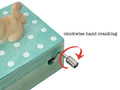 Mini wooden hand crank music box with a cute cat design, playing 