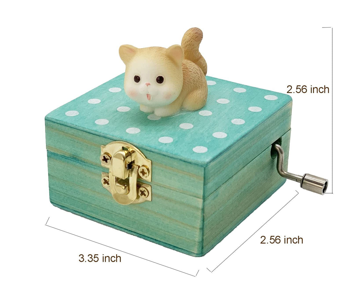 Mini wooden hand crank music box with a cute cat design, playing "Castle in The Sky," in a brownish yellow finish.