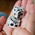 Set of 5 white skeleton dice for Halloween, mini decorative gaming dice with skeleton face design for party pretend play.