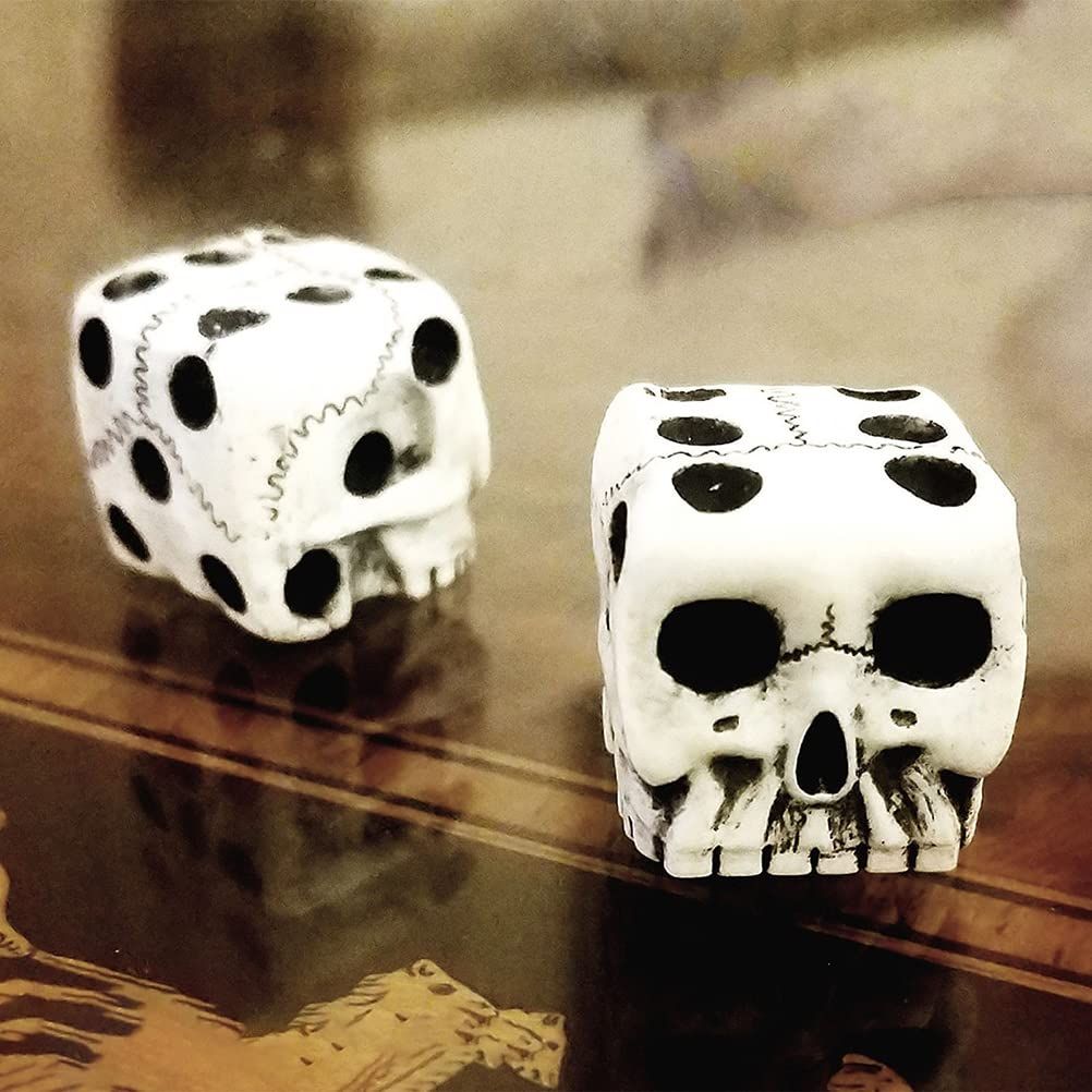 Set of five Halloween white skeleton dice for kids' pretend play, featuring mini skeleton faces for themed party fun.