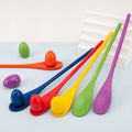 Wooden egg spoon race game set for kids, includes 6 pieces for outdoor relay races and Easter egg hunts in a lawn game activity.