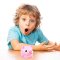 Cute screaming latex pig toy from Everything Baby, designed for kids' pretend play and stress relief, featuring a playful animal shape.