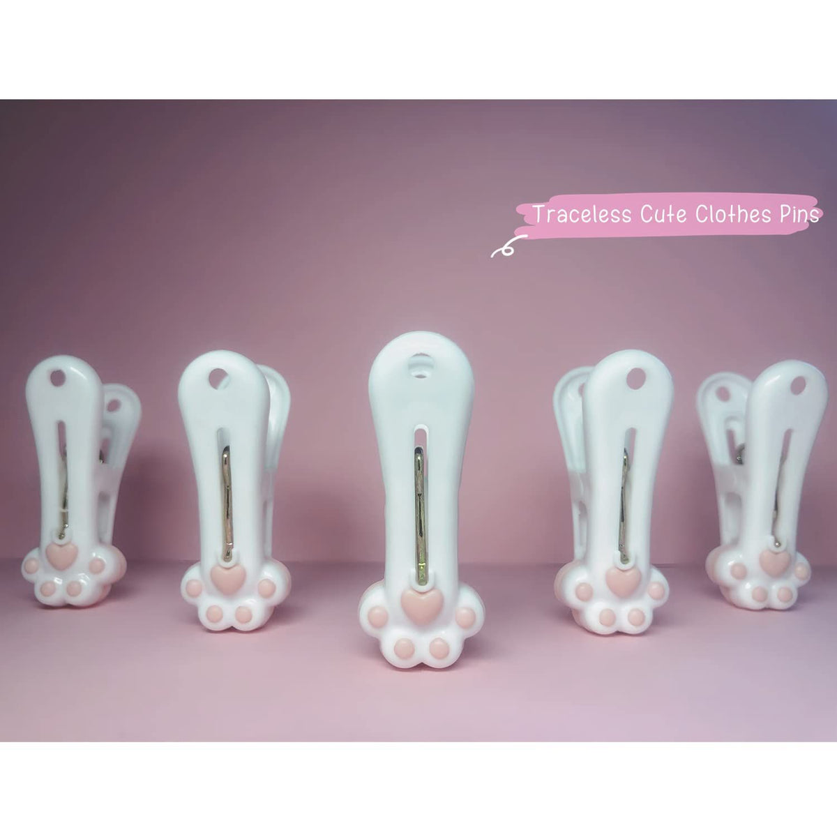 Set of 12 grey plastic clothespins featuring cute cat paw pattern, strong grip for laundry, food, and snack bags.